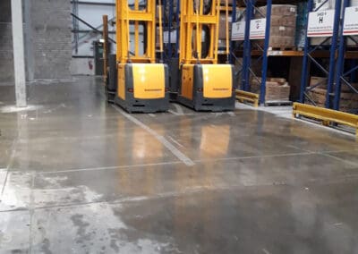 Warehouse forklifts and racking stacked high with very narrow aisles VNA guidance systems fitting Dublin Irleand